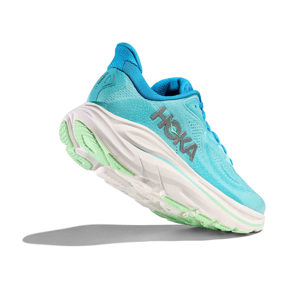 Lateral view - and outsole - of the right shoe from a pair of HOKA Women's Clifton 10 Running Shoes in the Skyward Blue/Cielo Blue colourway. (8637760798882)