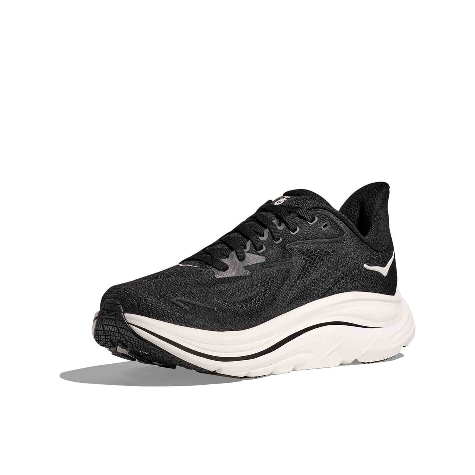 Medial view of the right shoe from a pair of HOKA Women's Clifton 10 Wide Running Shoes in the Black/White colourway. (8637785374882)