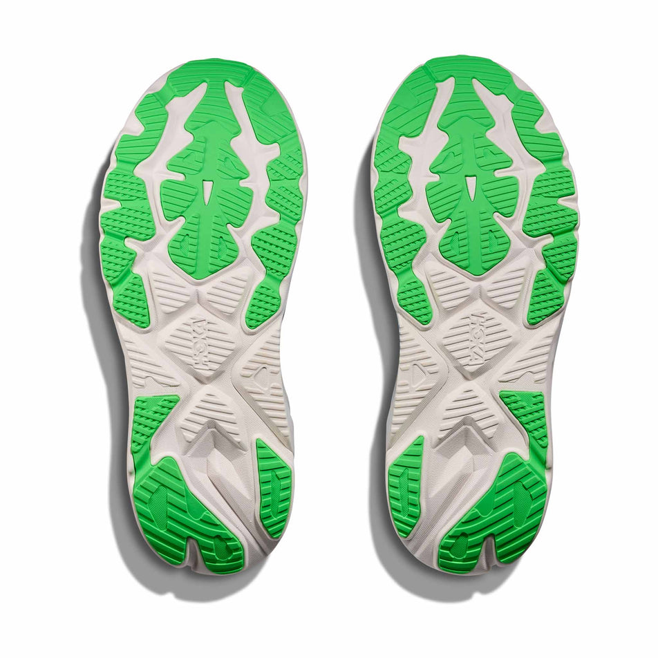 The outsoles of a pair of HOKA Men's Arahi 8 Running Shoes in the Cobalt Blue/Neon Green colourway.