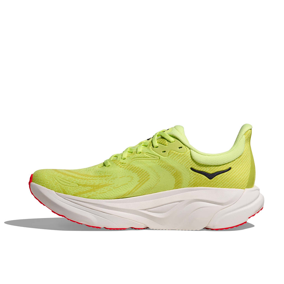 Medial view of the right shoe from a pair of HOKA Men's Arahi 8 Running Shoes in the Neon Yuzu/Neon Flame colourway.