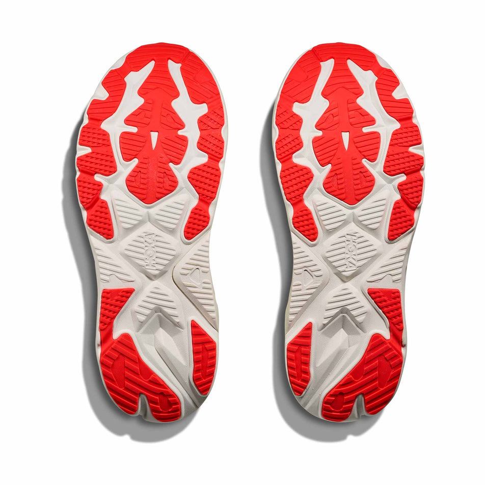 The outsoles of a pair of HOKA Men's Arahi 8 Running Shoes in the Neon Yuzu/Neon Flame colourway.