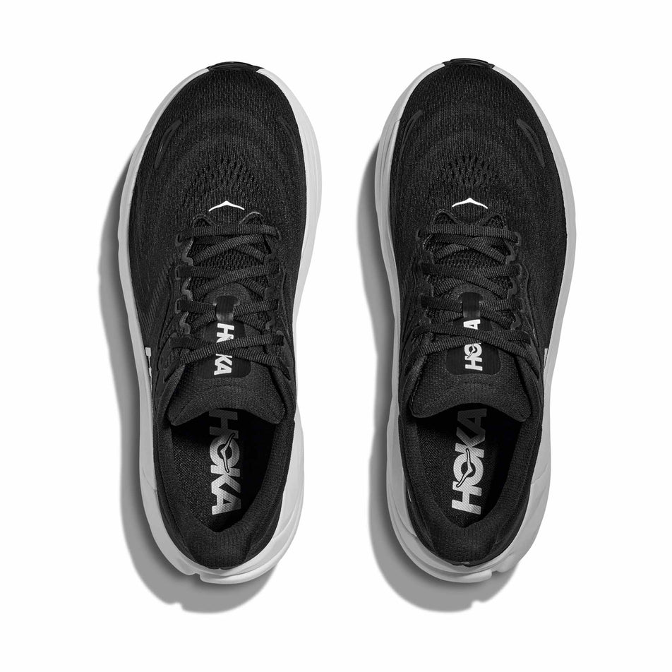 The uppers of a pair of HOKA Women's Arahi 8 Running Shoes in the Black/White colourway.