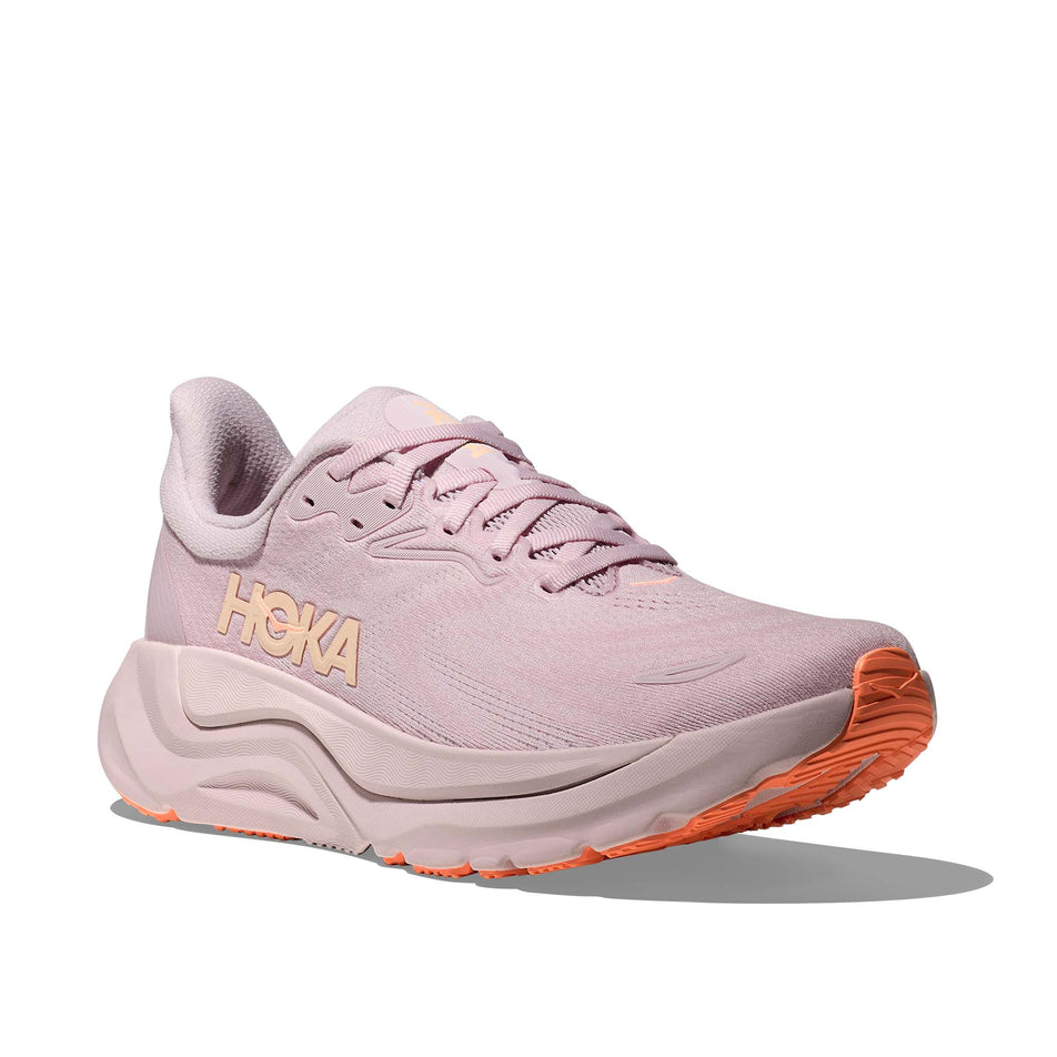Lateral view of the right shoe from a pair of HOKA Women's Arahi 8 Running Shoes in the Lilac Cream/Neon Cantaloupe colourway.