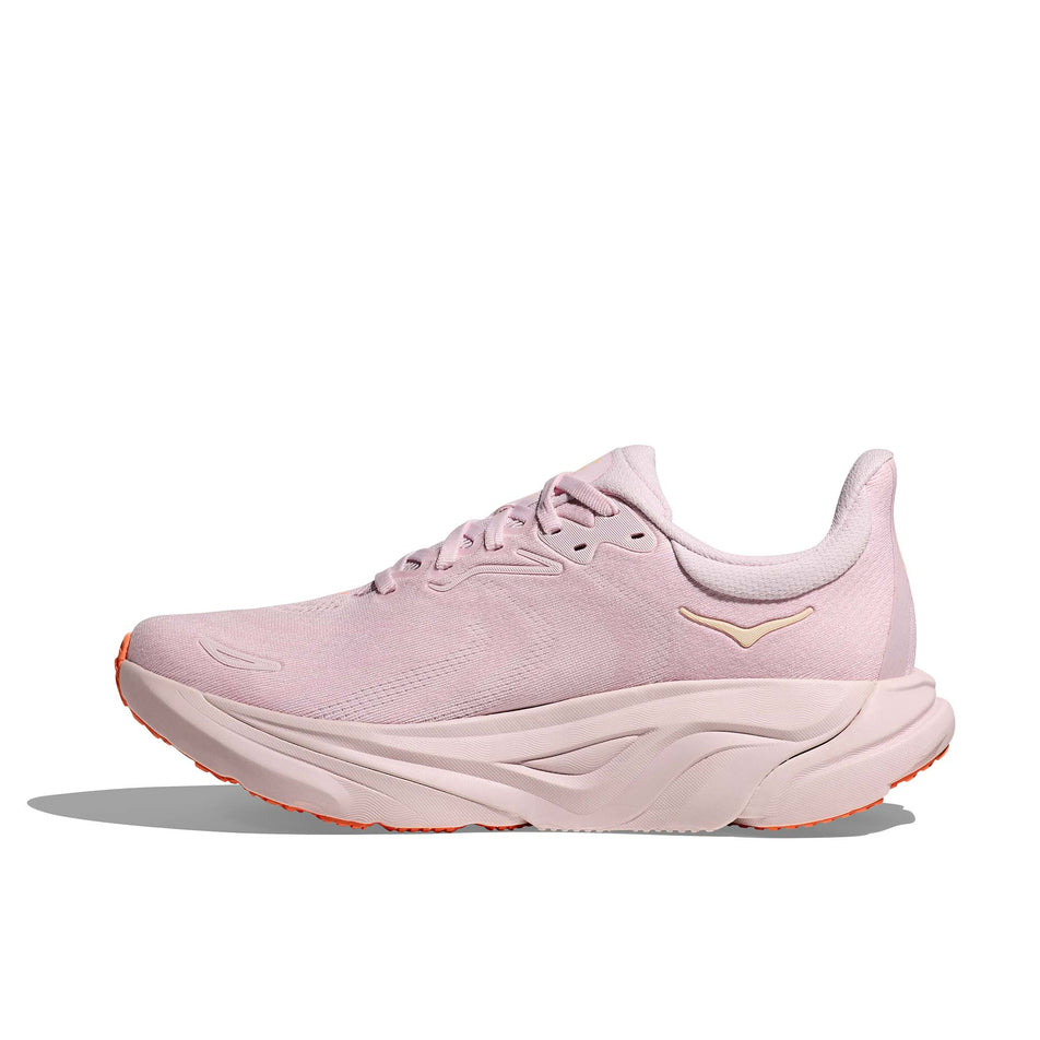 Medial view of the right shoe from a pair of HOKA Women's Arahi 8 Running Shoes in the Lilac Cream/Neon Cantaloupe colourway.