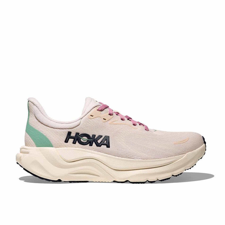 Lateral view of the right shoe from a pair of HOKA Women's Arahi 8 Running Shoes in the Rose Cream/Alabaster colourway. (8689326129314)