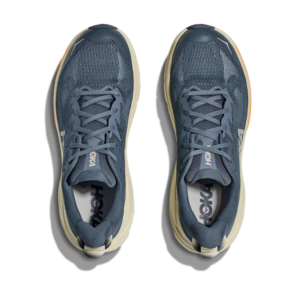 The uppers of a pair of HOKA Men's Challenger 8 Running Shoes in the Faded Navy/Pampass Grass colourway.