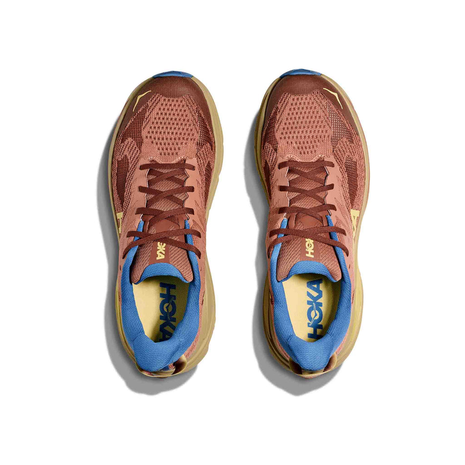 The uppers of a pair of HOKA Men's Challenger 8 Running Shoes in the Maple/Cardamom colourway. (8689254105250)