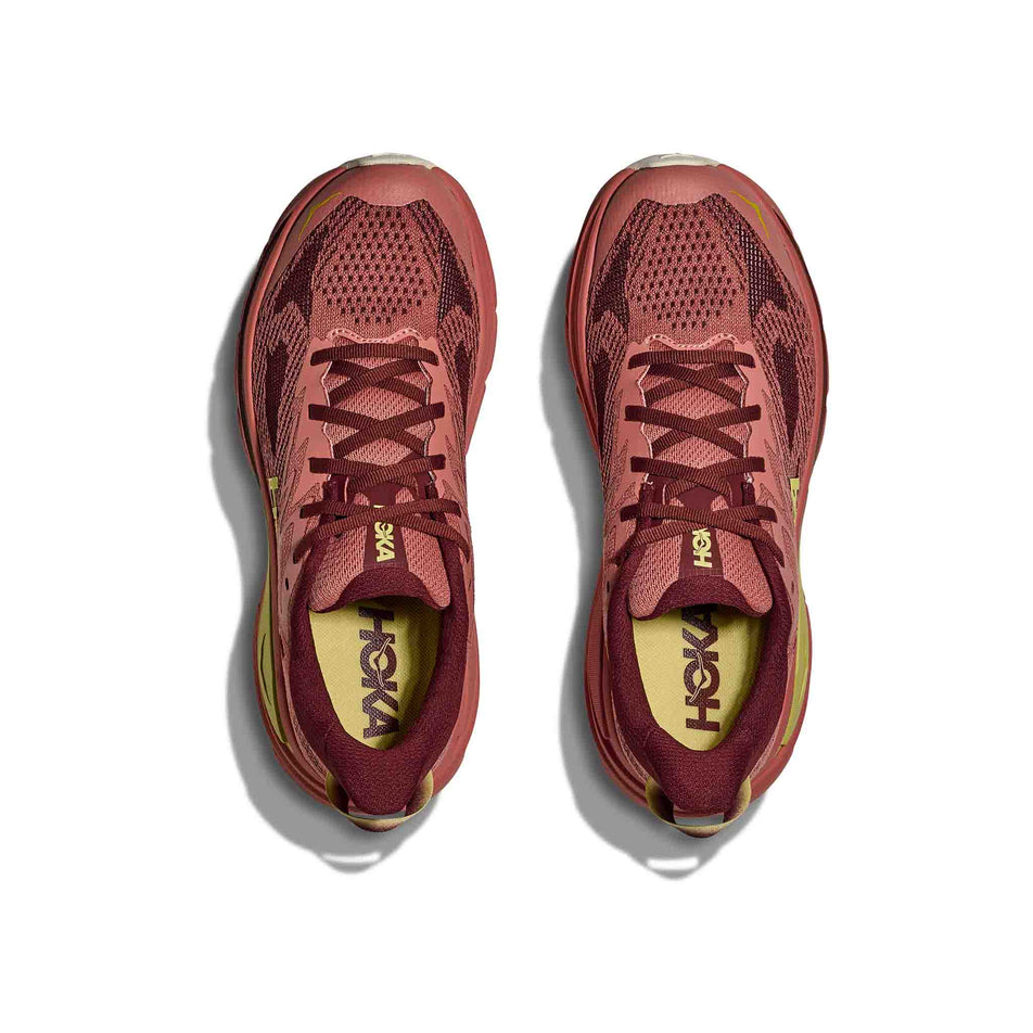 The uppers of a pair of HOKA Women's Challenger 8 Running Shoes in the Blush/Dark Cedar colourway. (8689379344546)