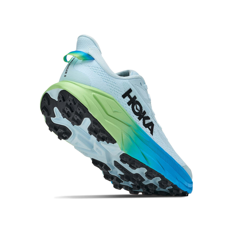 Lateral - and outsole - view of the right shoe from a pair of HOKA Women's Challenger 8 Running Shoes in the Glimmering Blue/Tart Apple colourway.