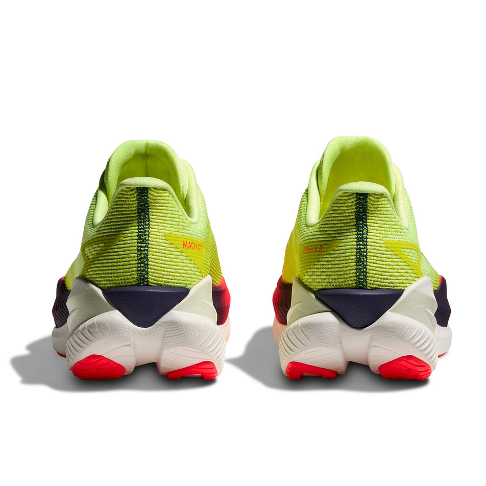 The back of a pair of HOKA Men's Mach X 3 Running Shoes in the Neon Yuzu/Squid Ink colourway.