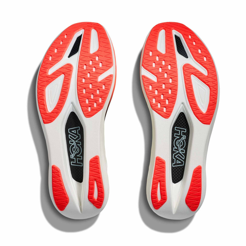 The outsoles of a pair HOKA Unisex Rocket X 3 Running Shoes in the Neon Yuzu/Squid Ink colourway.