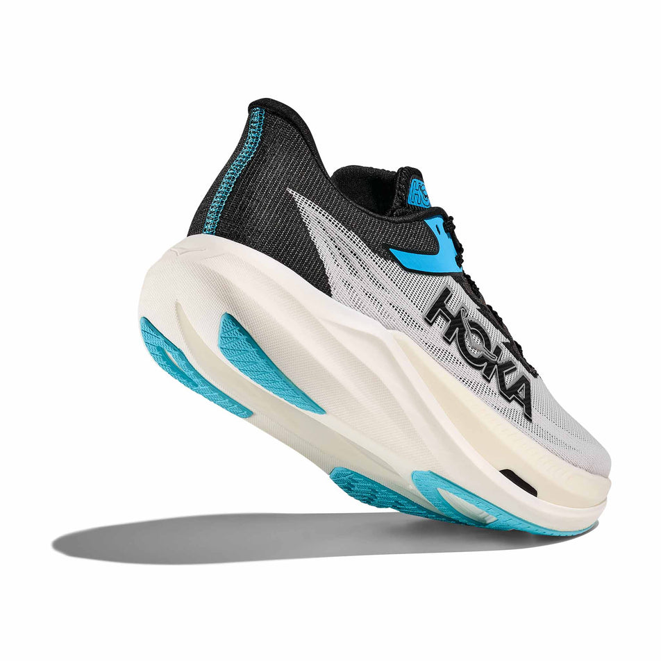 Lateral - and outsole - view of the right shoe from a pair of HOKA Unisex Rocket X 3 Running Shoes in the White/Black colourway. (8689387602082)