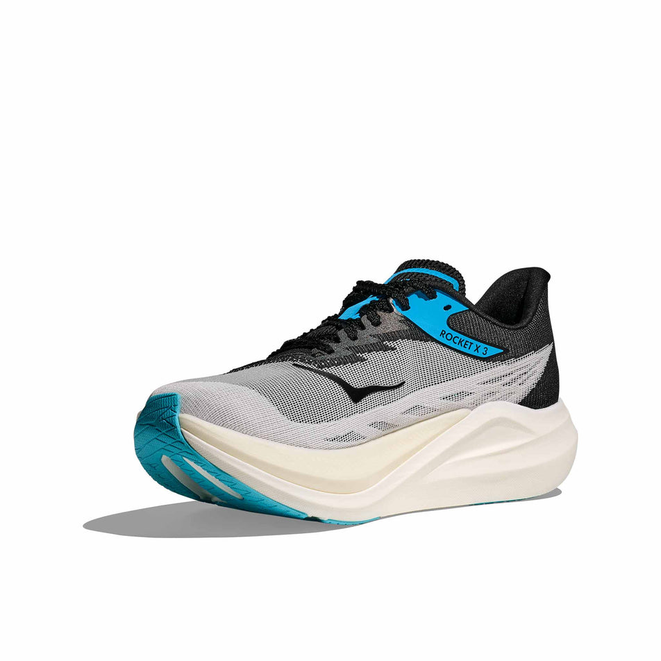Medial view of the right shoe from a pair of HOKA Unisex Rocket X 3 Running Shoes in the White/Black colourway. (8689387602082)