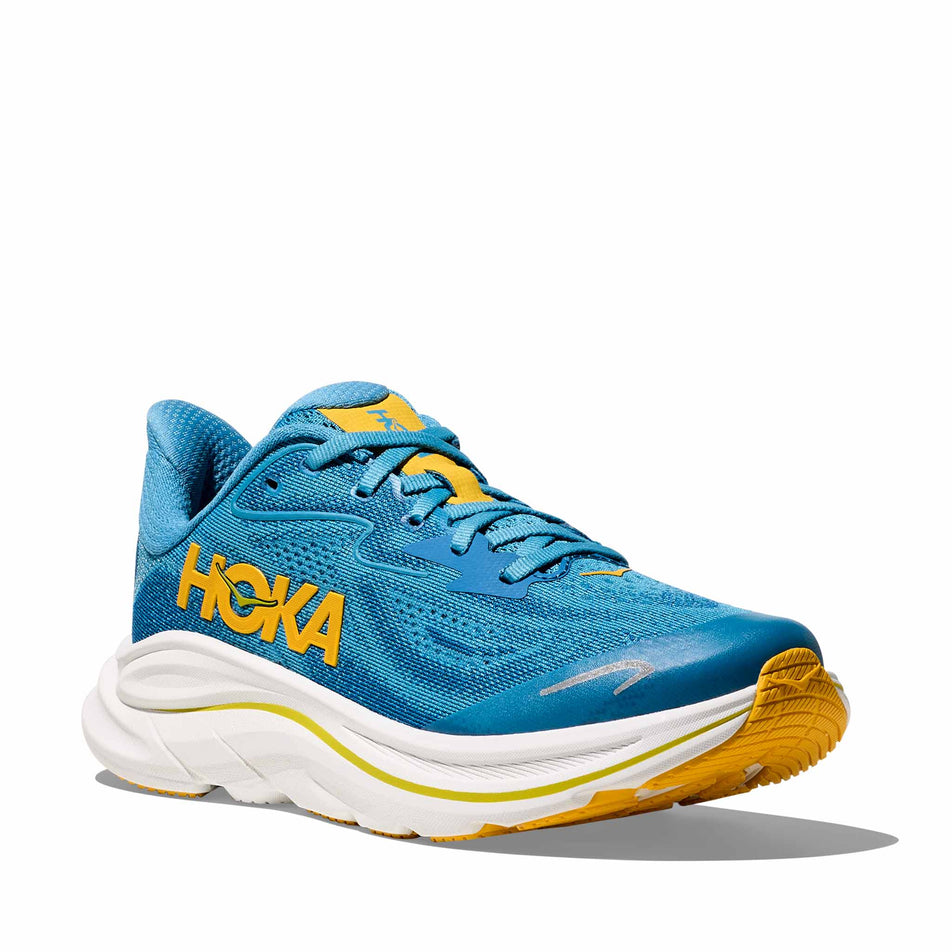 Lateral view of the right shoe from a pair of HOKA Clifton 10 Big Kids Running Shoes in the Alpine Blue/Foggy Night colourway.