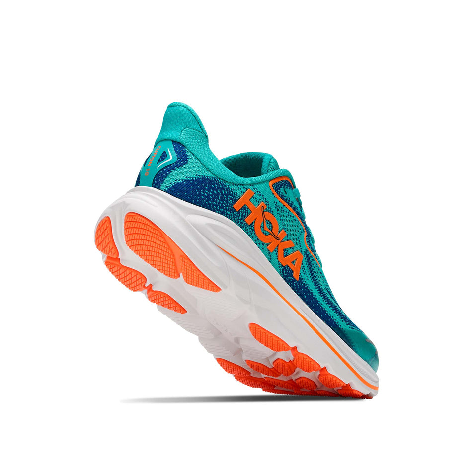 Lateral - and outsole - view of the right shoe from a pair of HOKA Clifton 10 Big Kids Running Shoes in the Night Glow Blue/Electric Aqua colourway.