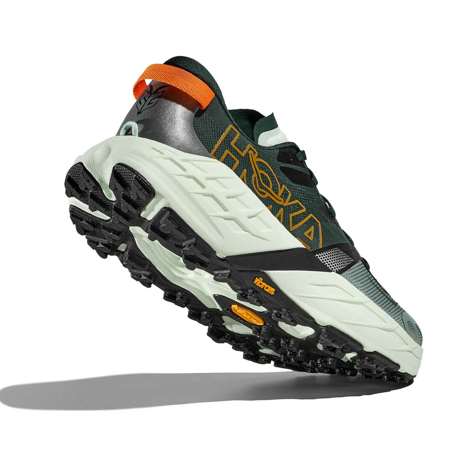 Lateral - and outsole - view of the right shoe from a pair of HOKA Men's Speedgoat 7 Running Shoes in the Bay Leaf/Sea Glass colourway.