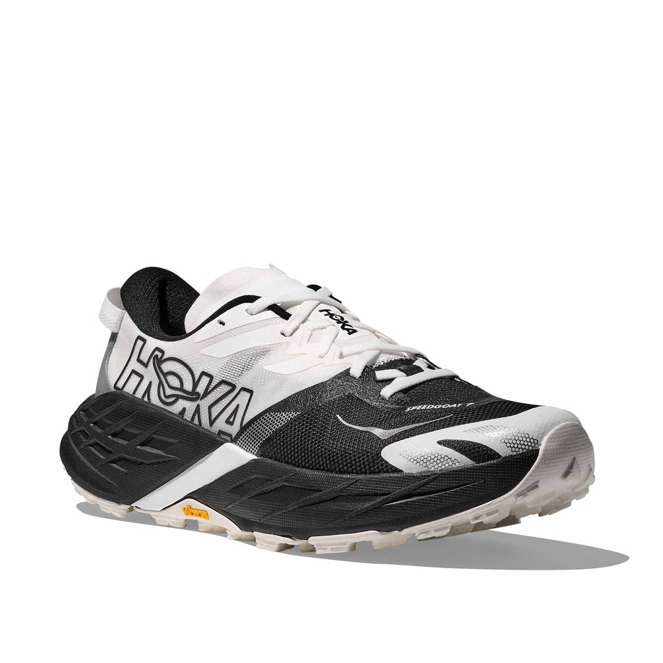 Lateral view of the right shoe from a pair of HOKA Women's Speedgoat 7 Running Shoes in the Black/White colourway.