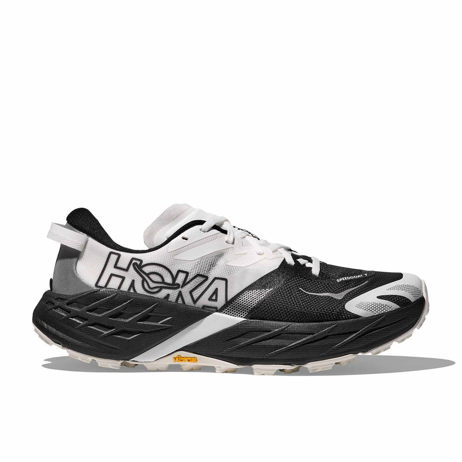 Lateral view of the right shoe from a pair of HOKA Women's Speedgoat 7 Running Shoes in the Black/White colourway.