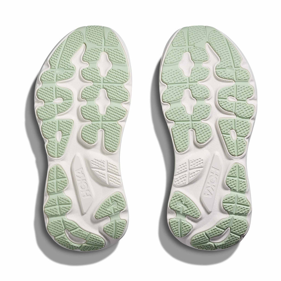 The outsoles of a pair of HOKA Women's Gaviota 6 Running Shoes in the Sea Glass/Sage colourway.