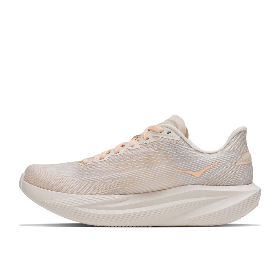 Medial view of the right shoe from a pair of HOKA Women's Mach 7 Running Shoes in the Oat Milk/Alabaster colourway.