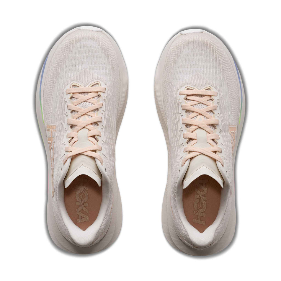 The uppers of a pair of HOKA Women's Mach 7 Running Shoes in the Oat Milk/Alabaster colourway.