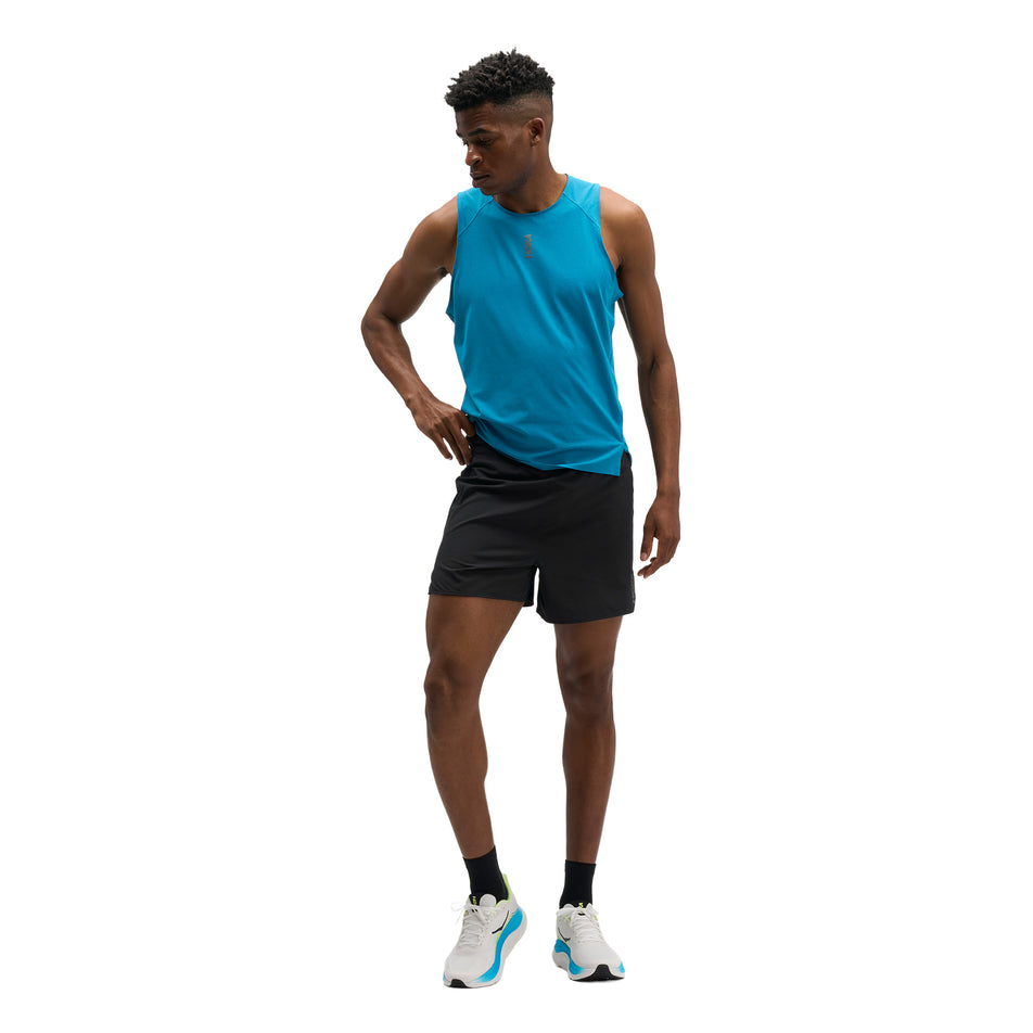 Front view of a model wearing the HOKA Men's Glide Shorts 5
