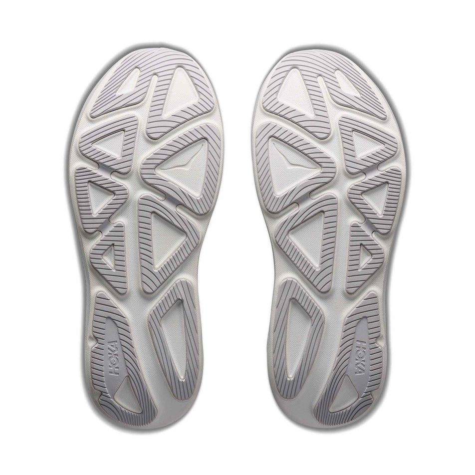 The outsoles of a pair of HOKA Men's Clifton Pro Running Shoes in the Varsity Navy/Soft Cobalt colourway.