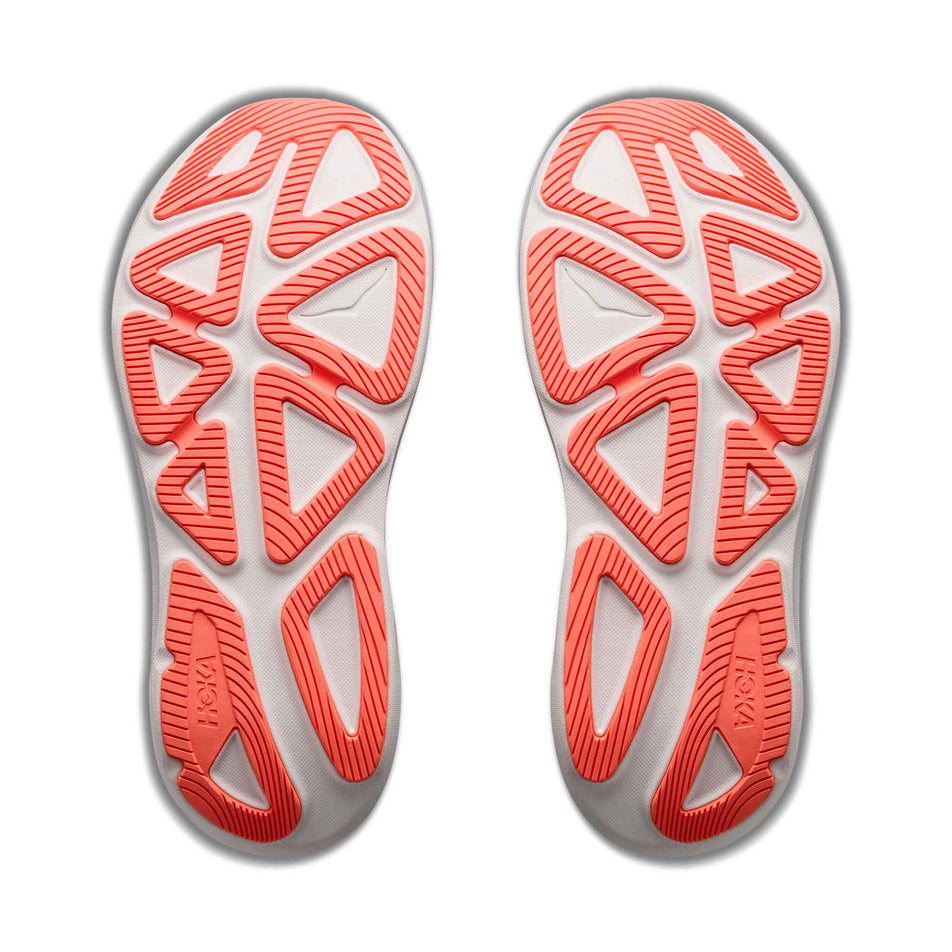 The outsoles of a pair of HOKA Women's Clifton Pro Running Shoes in the Faded Navy/Glimmering Blue colourway.