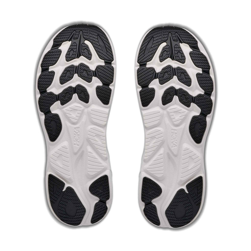 The outsoles of a pair of HOKA Men's Clifton 11 Running Shoes in the Frost/Black colourway.