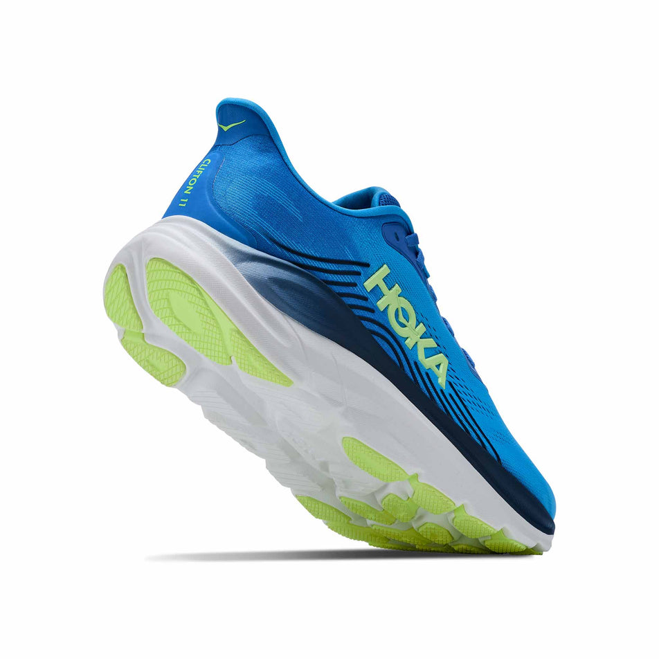 Lateral - and outsole - view of the right shoes from a pair of HOKA Men's Clifton 11 Running Shoes in the Virtual Blue/Soft Cobalt colourway.