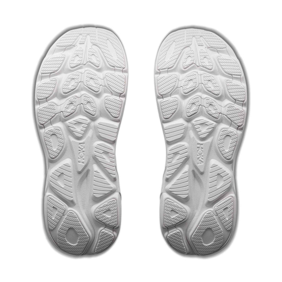 The outsoles a pair of HOKA Women's Clifton 11 Running Shoes in the White/White colourway.