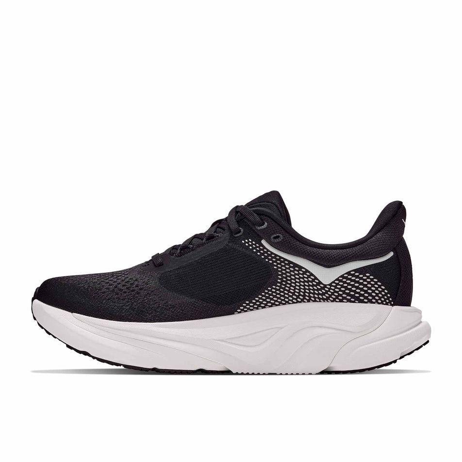 Medial view of the right shoe from a pair of HOKA Men's Arahi 9 Wide Running Shoes in the Black/White colourway.
