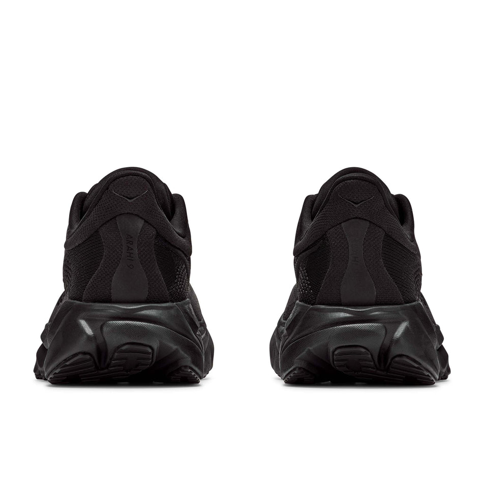 The back of a pair of HOKA Women's Arahi 9 Wide Running Shoes in the Black/Black colourway.