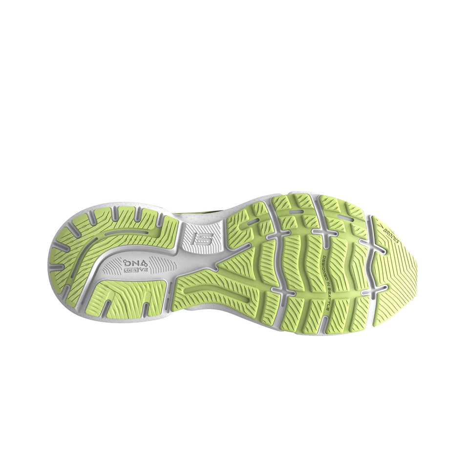 The outsole of the right shoe from a pair of Brooks Women's Ghost 15 Running Shoes in the Black/Ebony/Sharp Green colourway (7904394969250)