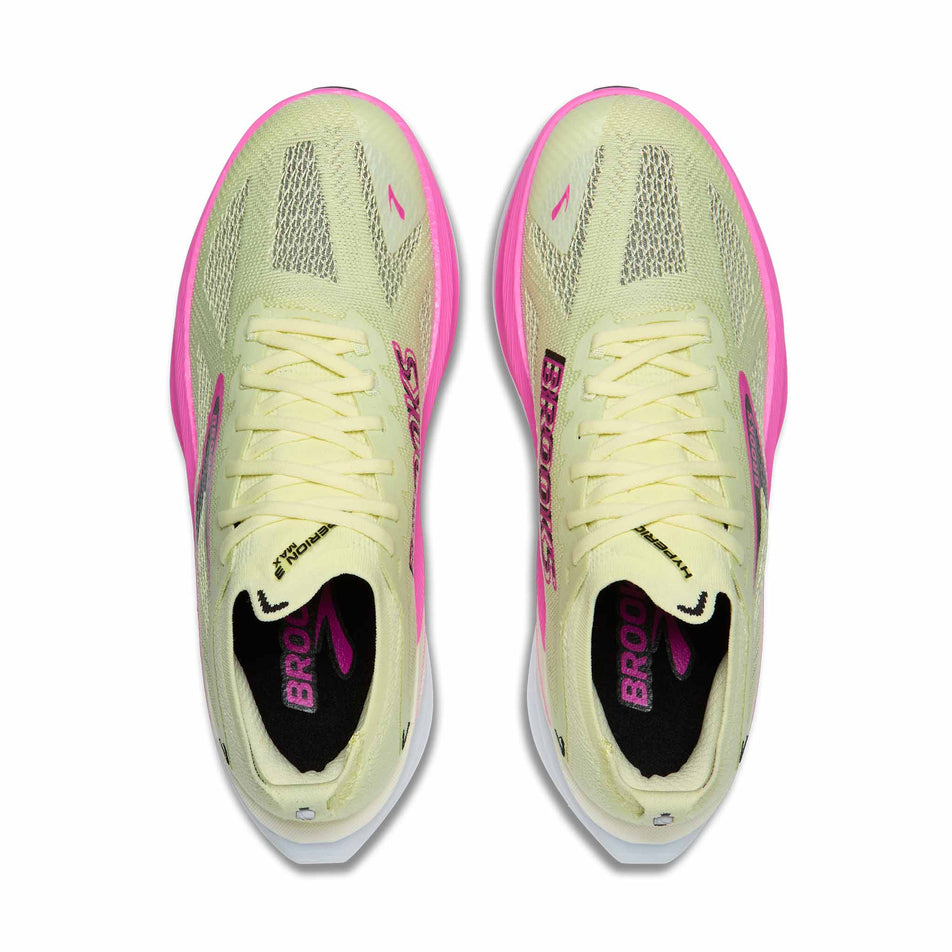 The uppers of a pair of Brooks Women's Hyperion Max 3 Running Shoes in the Luminary/Cyber Pink/Black colourway.
