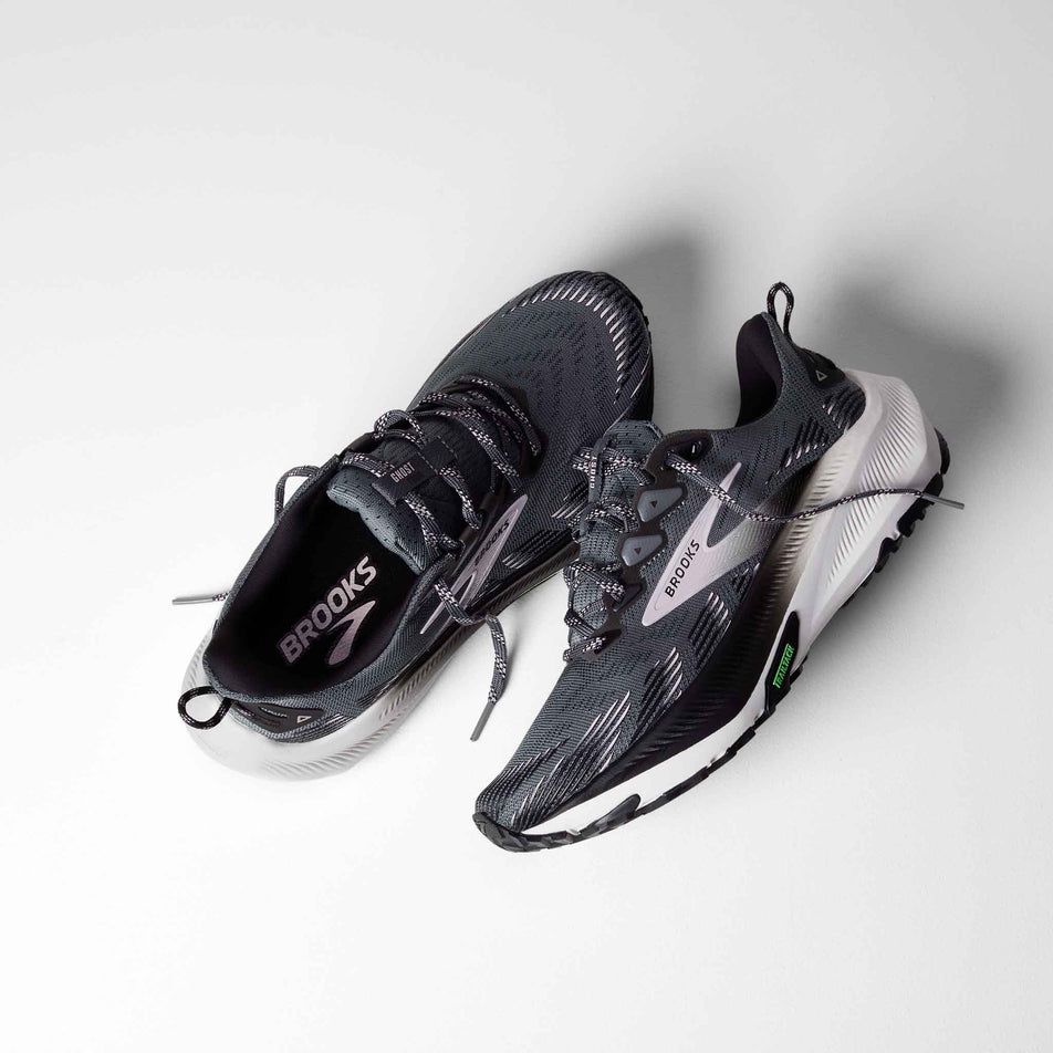 A pair of Brooks Women's Ghost Trail Running Shoes in the Poppy Seed/Black/Pink colourway.