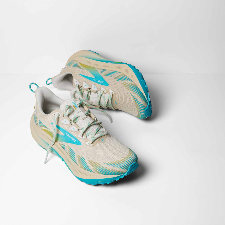 A pair of Brooks Women's Ghost Trail Running Shoes in the Sand/Star White/Golden Hour colourway.