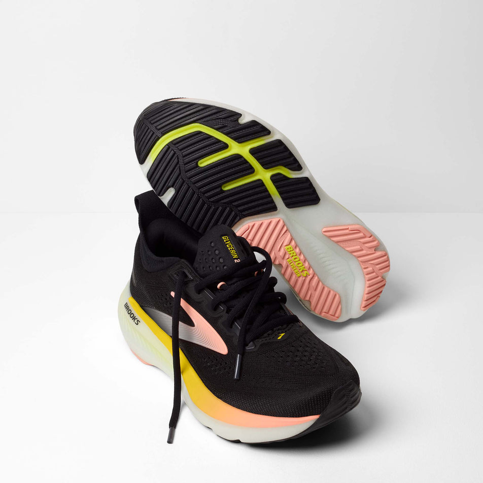 A pair of Brooks Women's Glycerin 23 Running Shoes in the Black/Peach/Nightlife colourway.