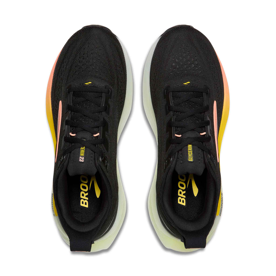 The uppers of a pair of Brooks Women's Glycerin 23 Running Shoes in the Black/Peach/Nightlife colourway.
