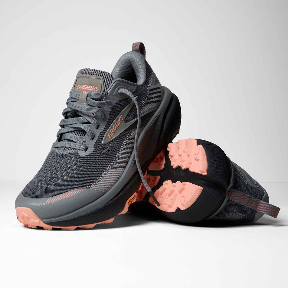 A pair of Brooks Women's Cascadia 20 Running Shoes in the Grey/Grey/Peach colourway.