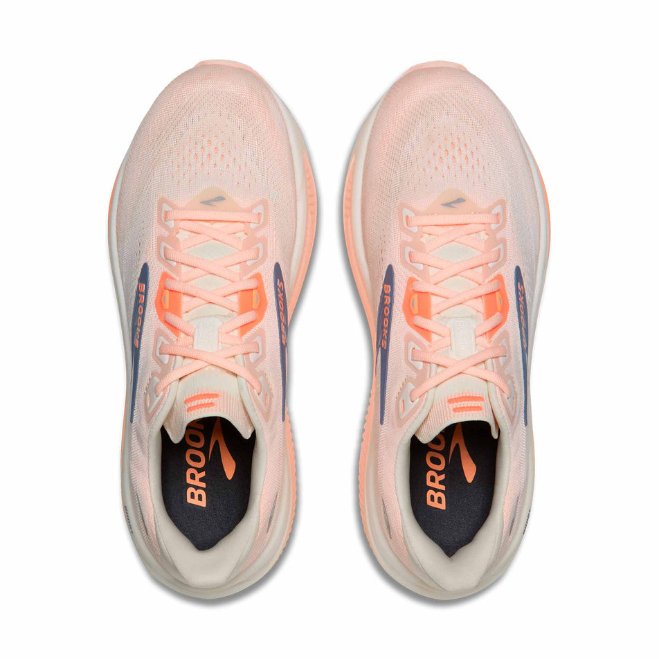The uppers of a pair of Brooks Women's Ghost 18 Running Shoes in the Star White/Cyber Peach/Grey colourway.