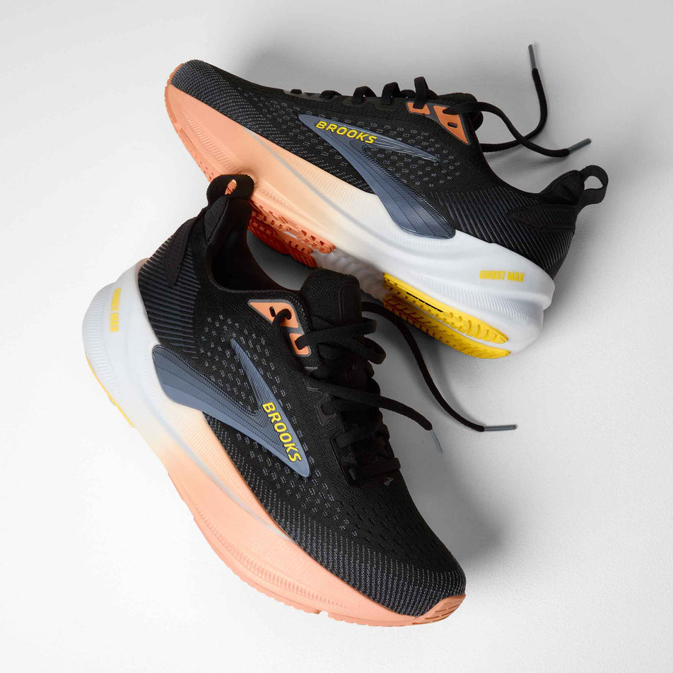 A pair of Brooks Women's Ghost Max 4 Running Shoes in the Black/Folkstone/Cyber Peach colourway.