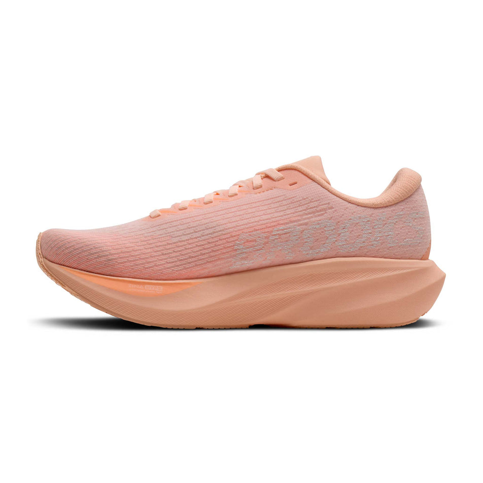 Medial view of the right shoe from a pair of Brooks Women's Ghost AMP Running Shoes in the Peach/Peach/White colourway.