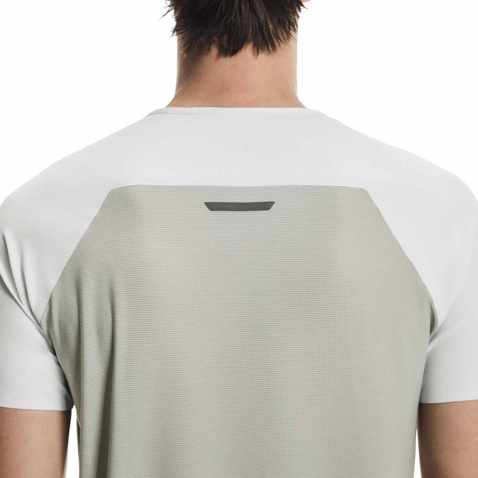 Back view of a model wearing the On Men's Performance-T in the Iceberg/Tin colourway.