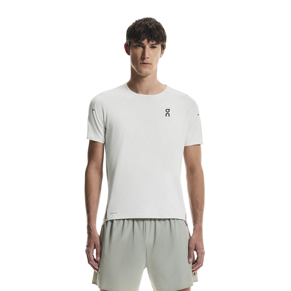 Front view of a model wearing the On Men's Performance-T in the Iceberg/Tin colourway.