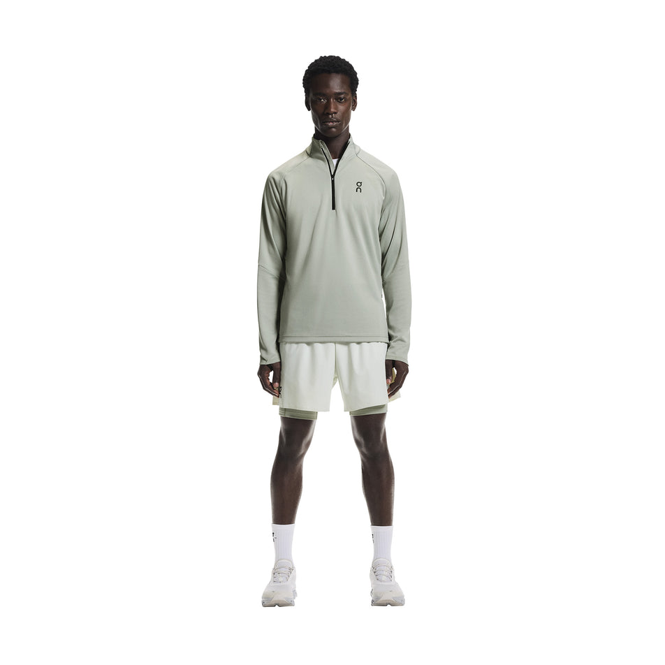 Front view of a model wearing the On Men's Climate Shirt in the Tin colourway.