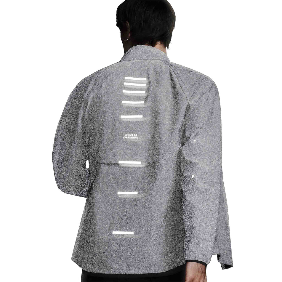 The reflective detail on the On Men's Weather Jacket Lumos in the Eclipse colourway. (8790125510818)