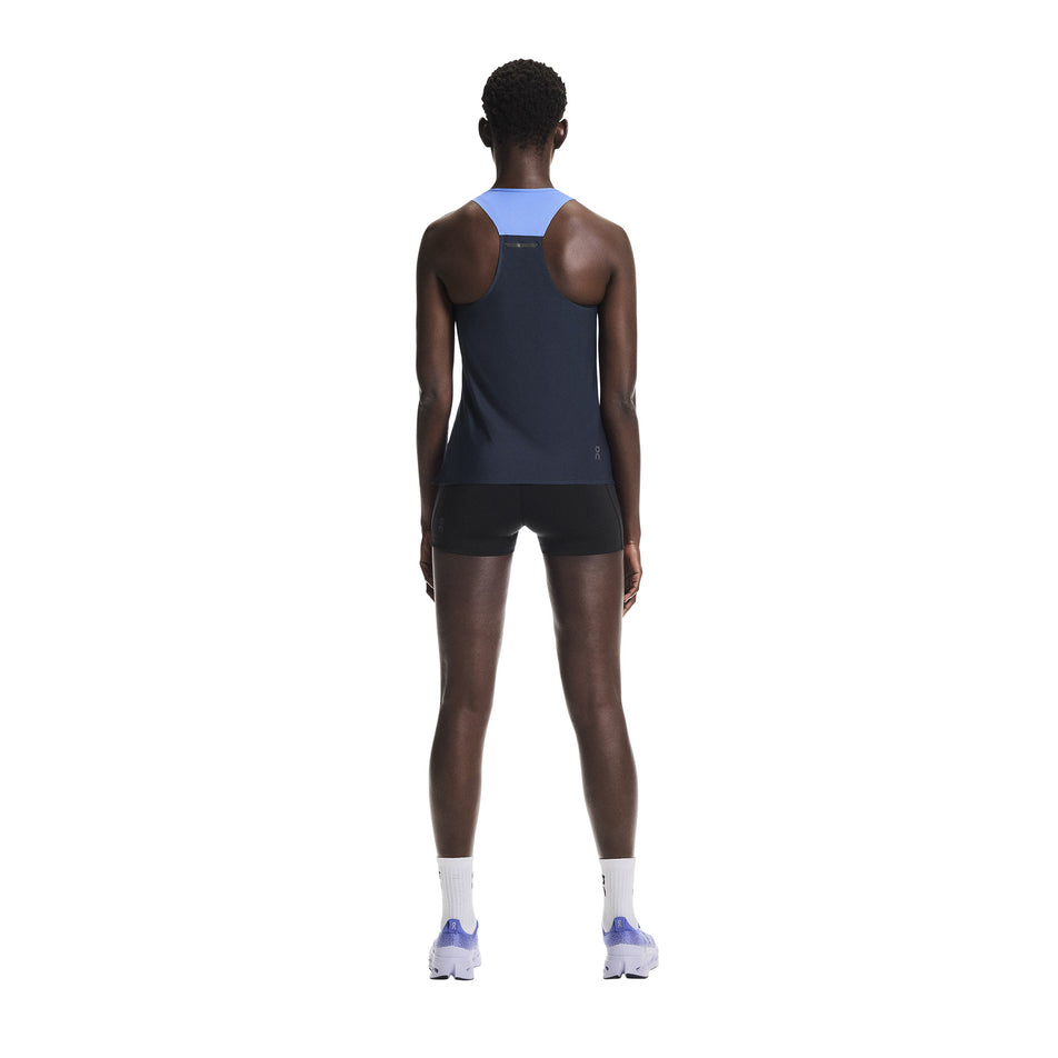 Back view of a model wearing the On Women's Performance Tank in the Sailor/Navy colourway.