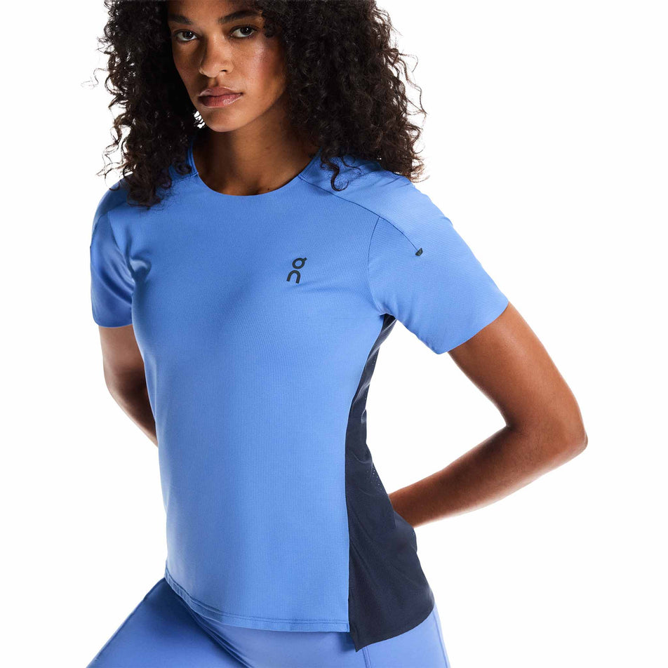 Front view of a model wearing the On Women's Performance-T in the Sailor/Navy colourway.