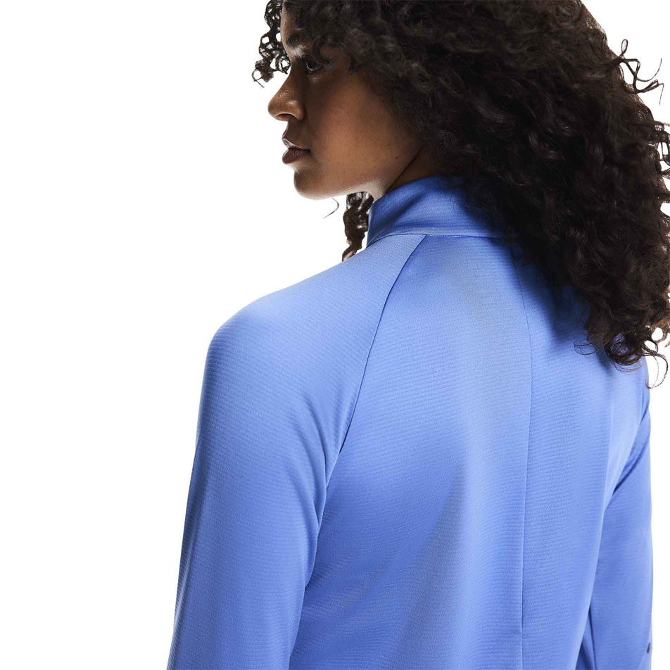 Back view of a model wearing the On Women's Climate Shirt in the Sailor colourway.